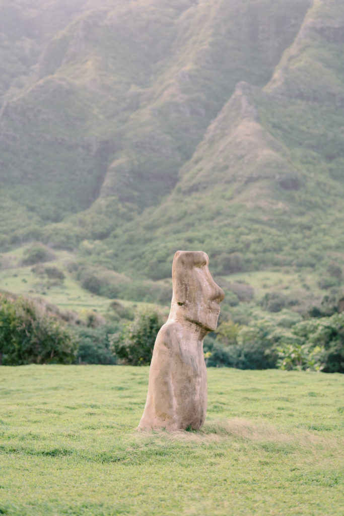 Hawaii Moai statue in Kualoa Ranch Oahu. A perfect intimate setting for a bride and groom on their wedding day. Photography by Megan Moura