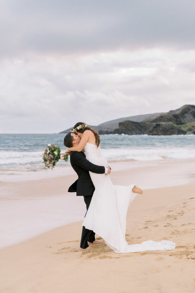 Along the shore at Sandy Beach, a long white sand beach on Oahu, Hawaii. Wedding photographer Megan Moura took these photographs with her Nikon camera.