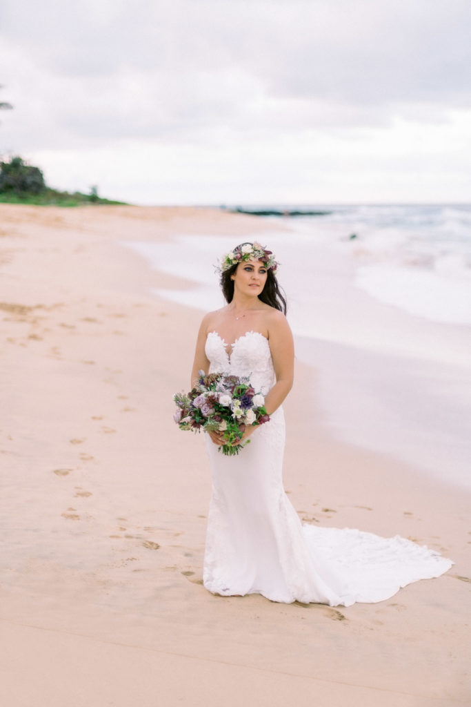 Recently married couple hires a local Honolulu wedding photographer to capture their event.