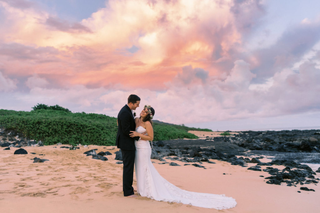 Blushing bride on the beach in Hawaii