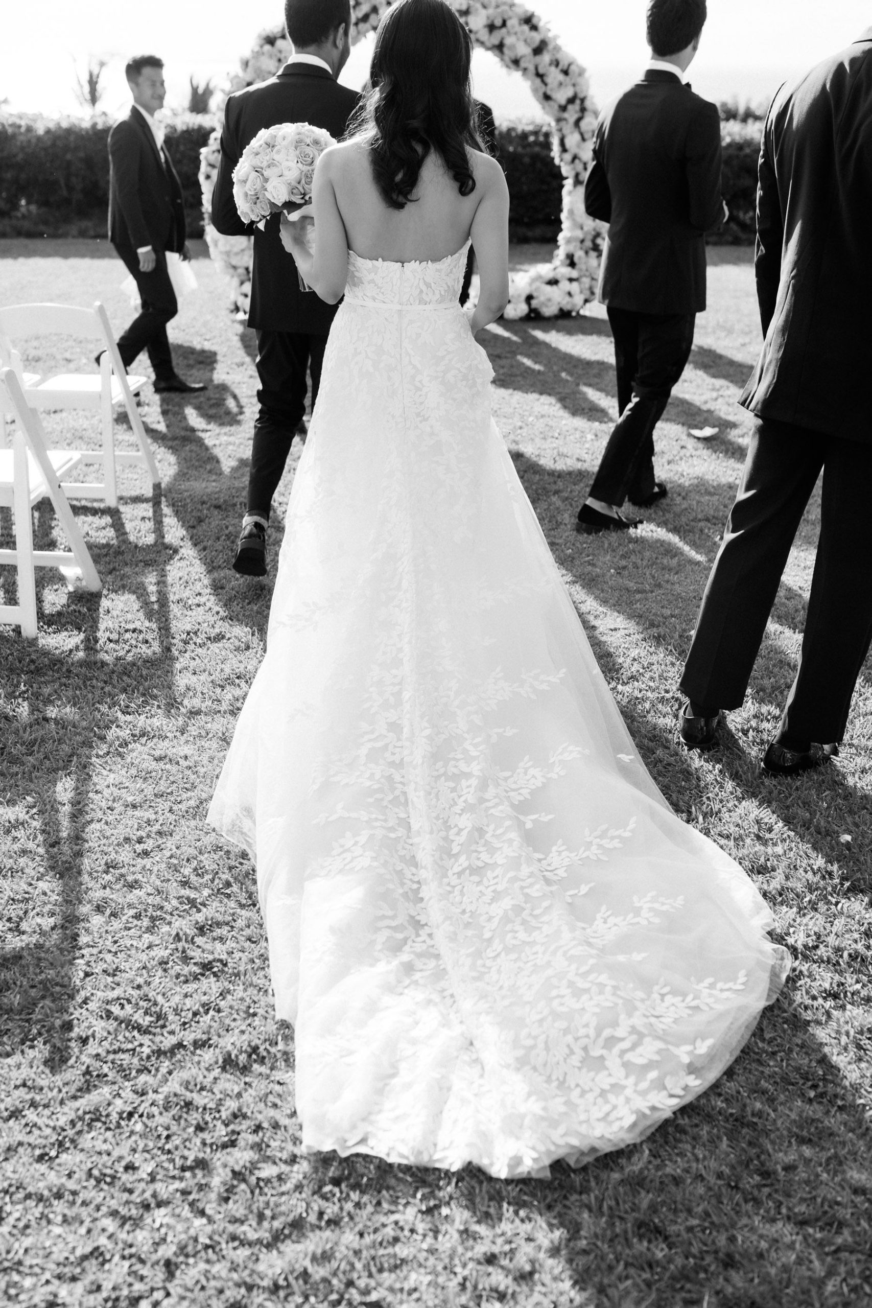 Black and White photo of  Back of Bride's Wedding Dress Destination Wedding at Hotel Wailea