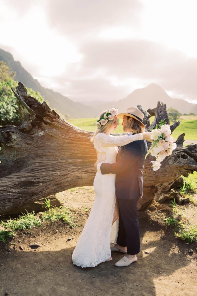 Bride and Groom looking into each others eyes at Kualoa Ranch Elopement