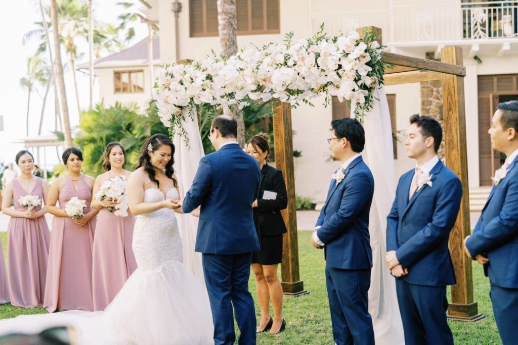 Exchange of vows at Oahu Wedding at The Halekulani Hotel