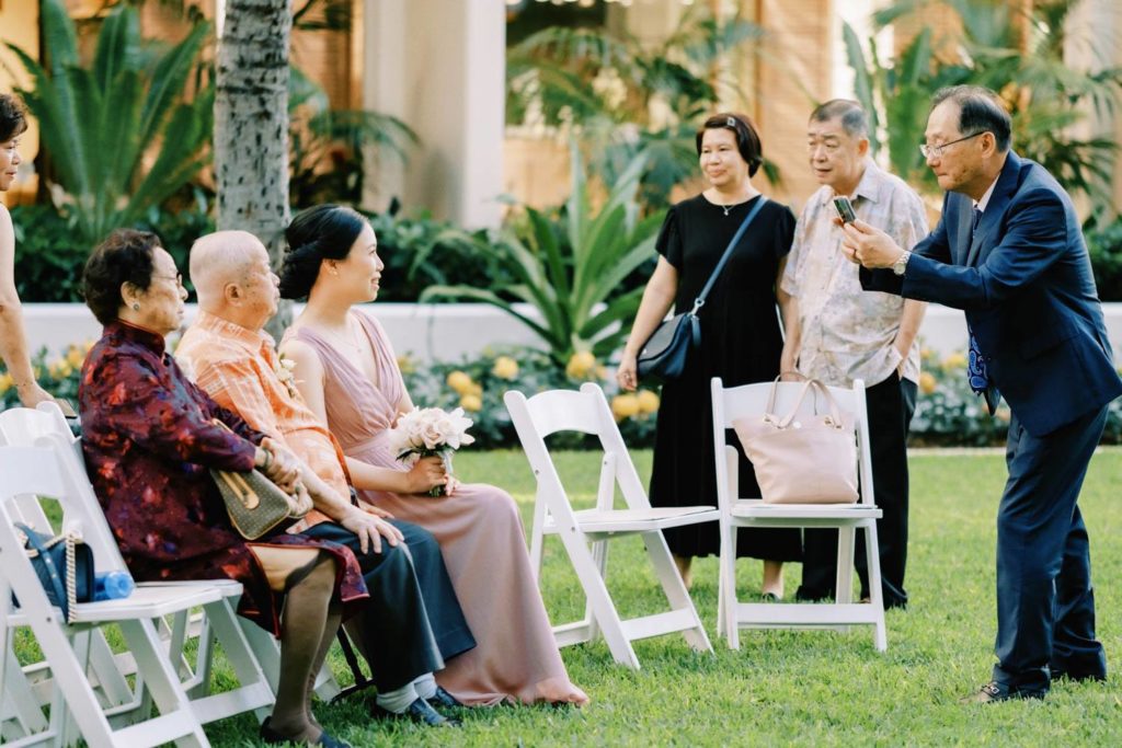 Family sitting at Oahu Wedding in The Halekulani Hotel