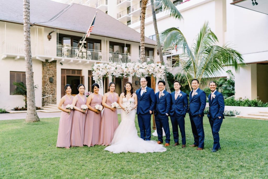 Newlyweds with bridesmaids and groomsmen at Oahu Wedding