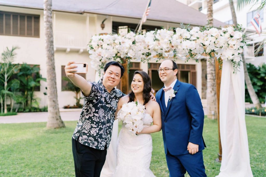 Selfie with bridesmaids and groomsmen at Oahu Wedding