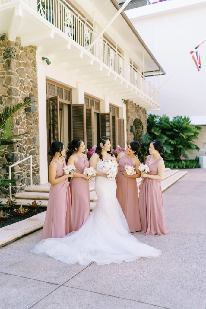 Bride with bridesmaids Oahu Wedding at The Halekulani Hotel