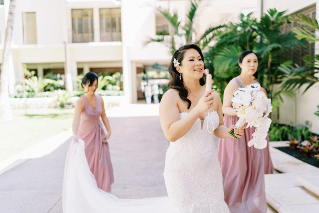 Bride walking towards the reception Oahu Wedding