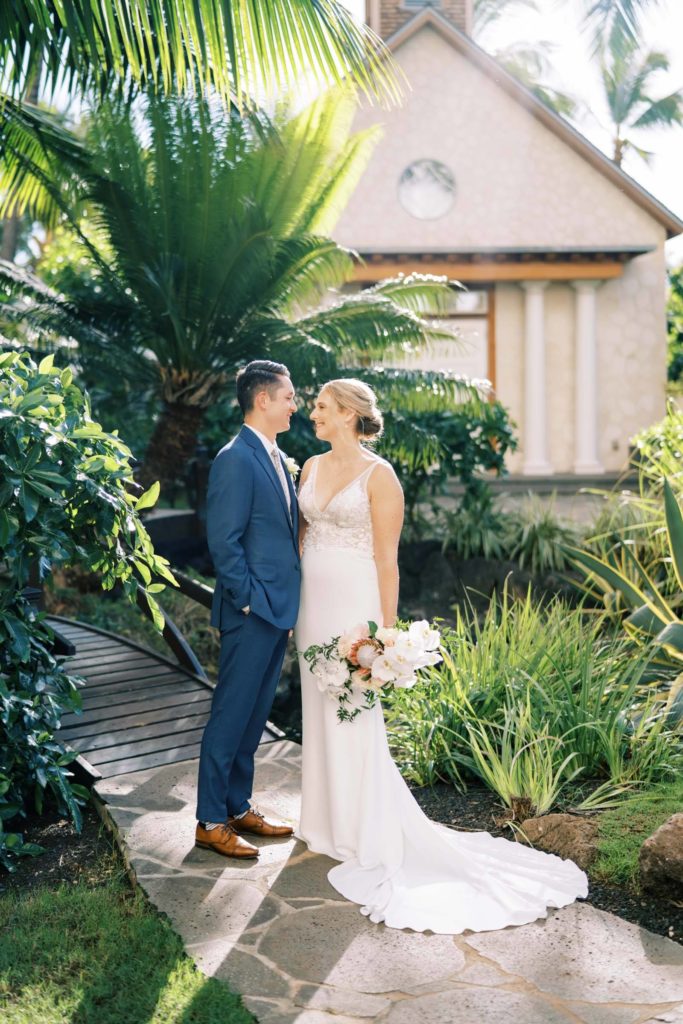 Newlyweds in the Four Seasons Intimate Oceanside Elopement on Oahu Hawaii