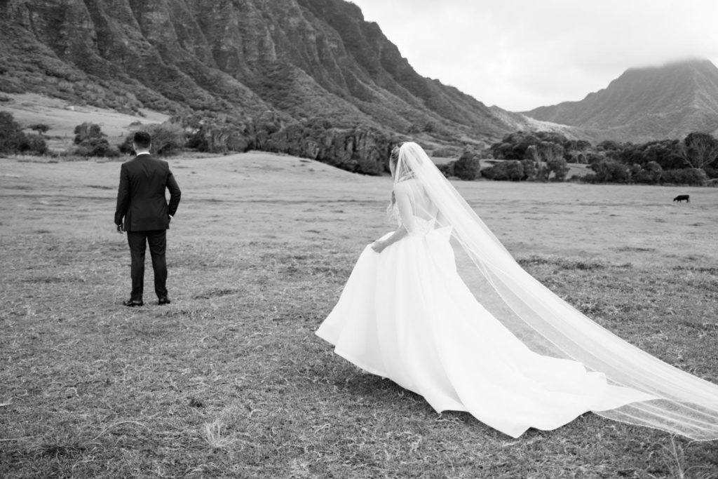 black and white photo of bride and groom at kualoa ranch