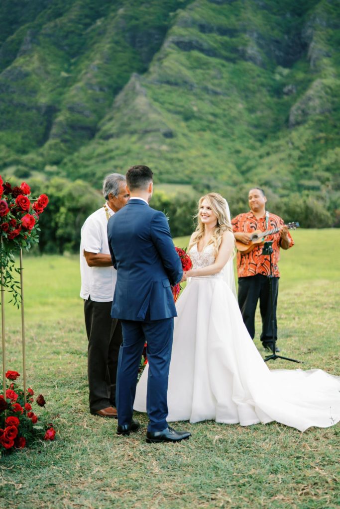 Happy bride during ceremony Intimate Elopement at Kualoa Ranch on Oahu