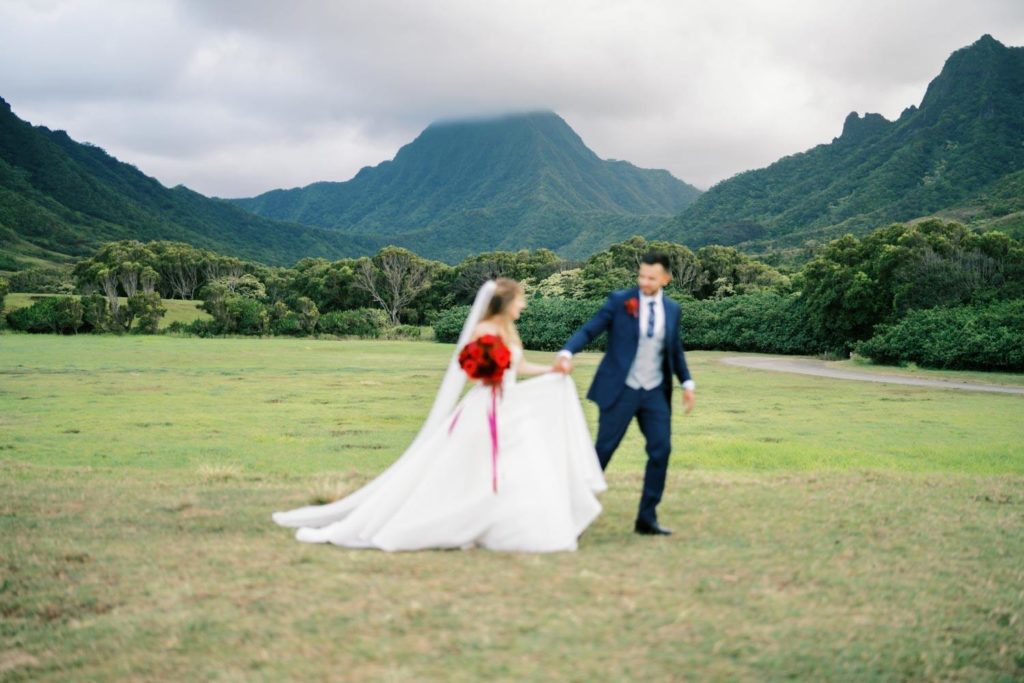 Bride and Groom About to Run Intimate Elopement at Kualoa Ranch on Oahu