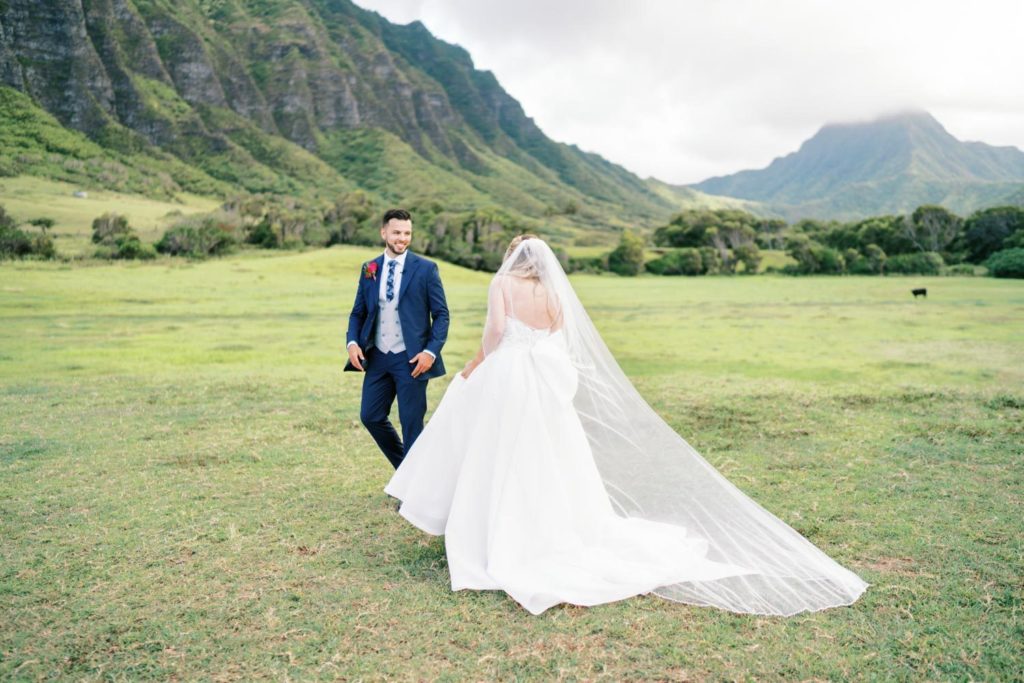 Bride and Groom playing around Intimate Elopement at Kualoa Ranch on Oahu