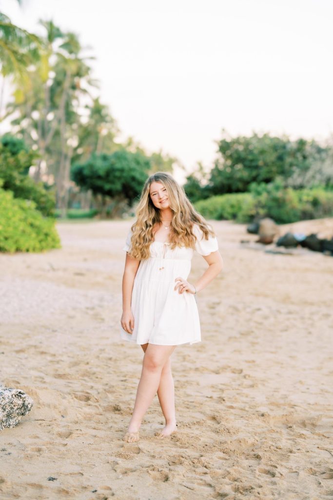 Young woman in white dress at the beach - Oahu High School Senior Portraits