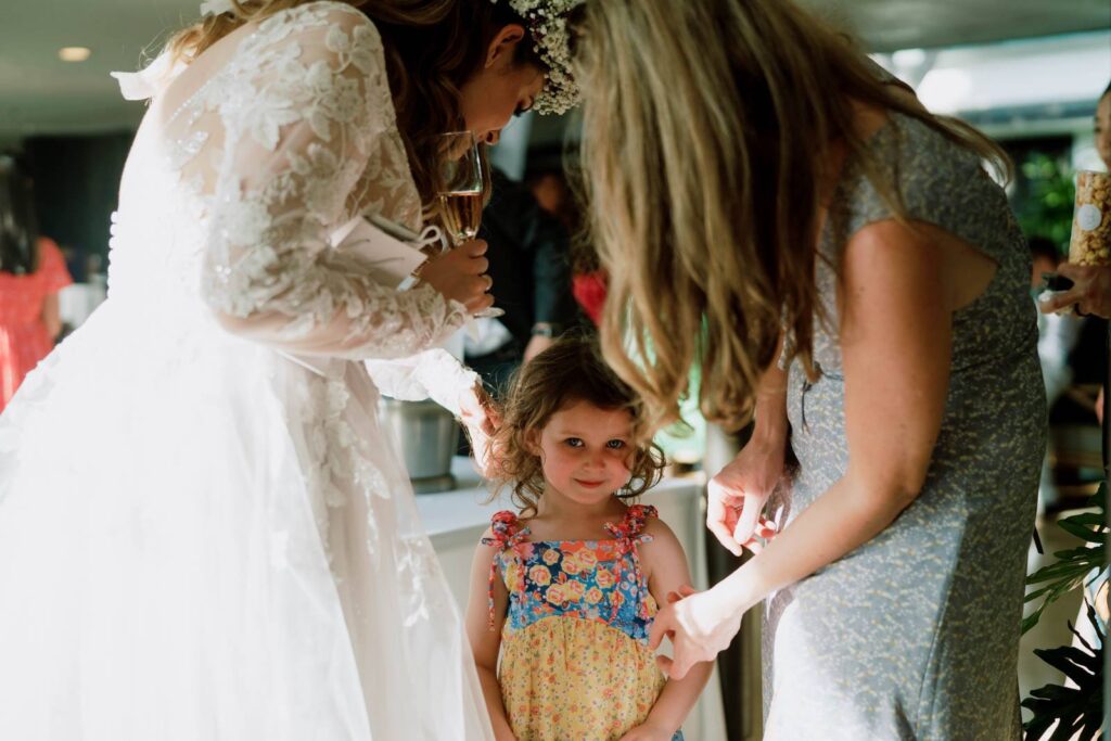 Little Girl Smiling in Wedding Reception of private wedding