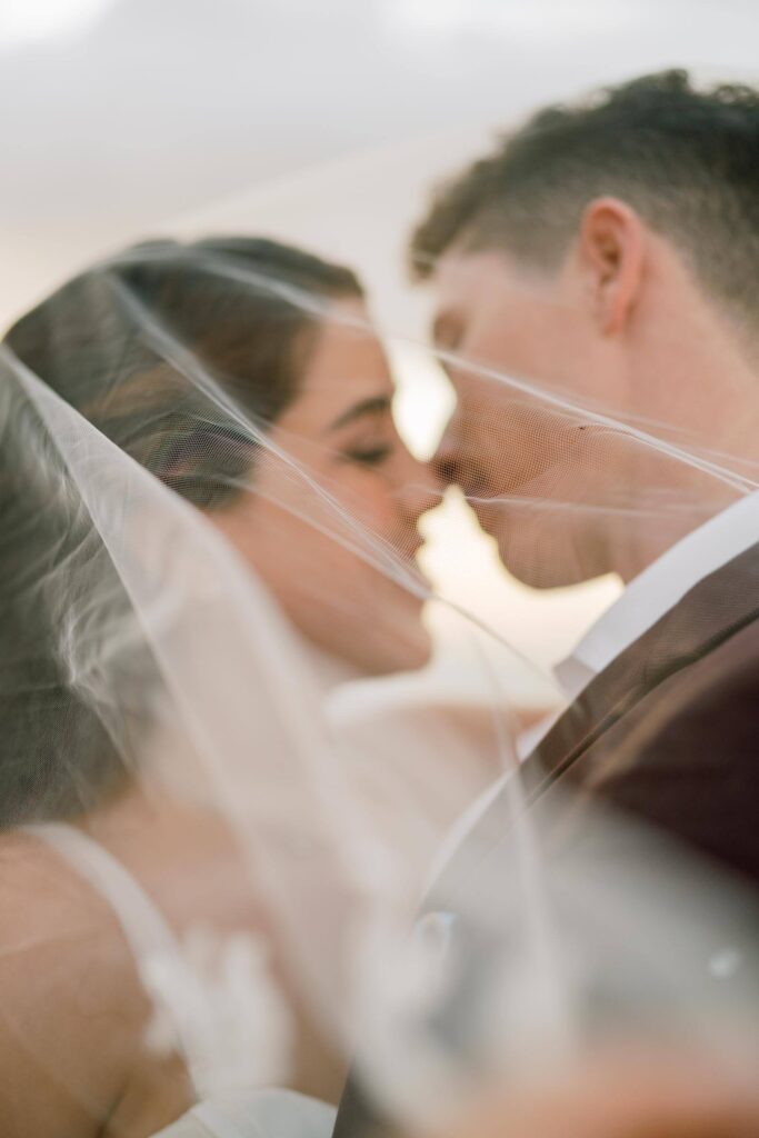 Oahu Private Wedding Day Intimate Kiss under the veil