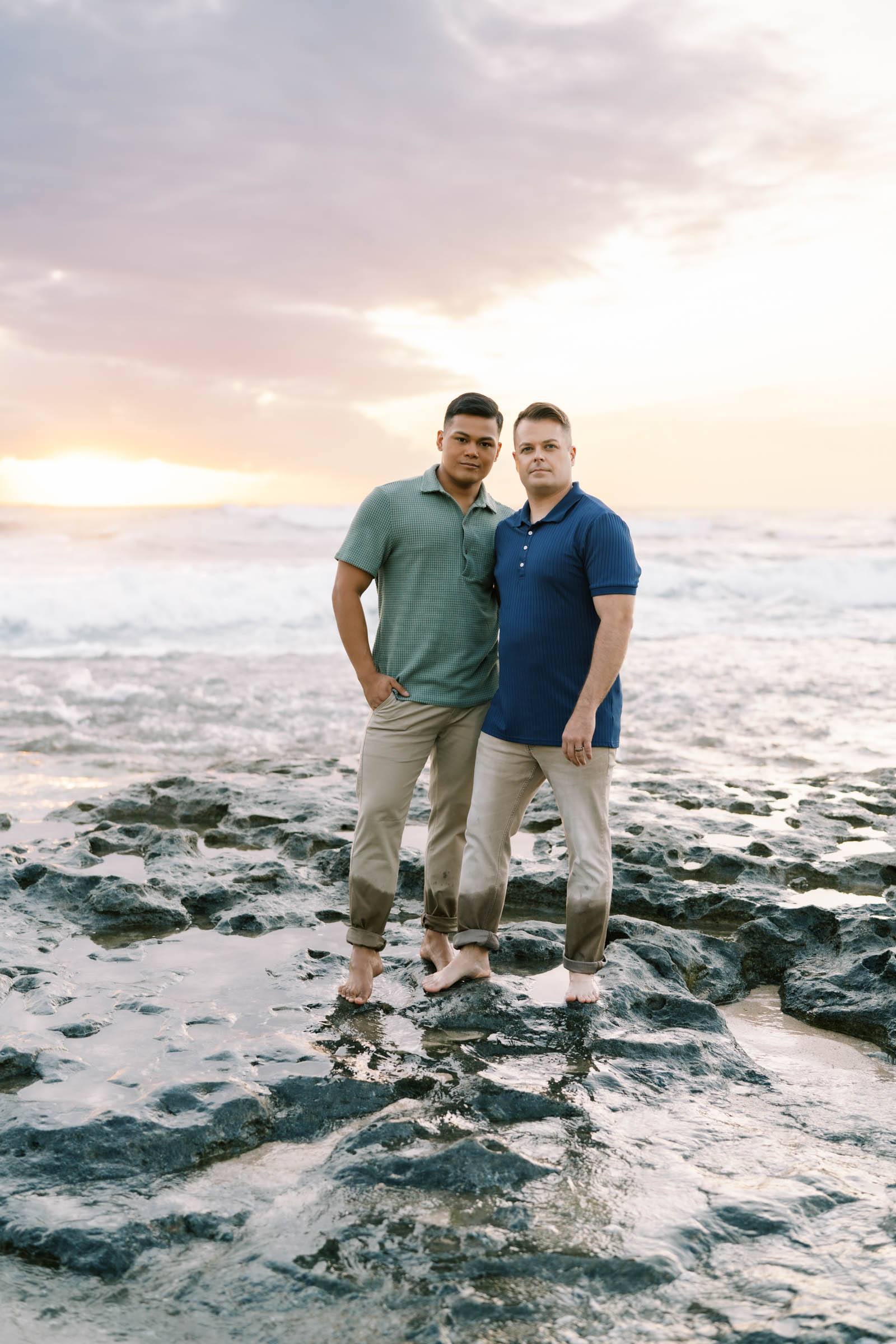 Oahu Engagement Session LGBTQ couple hugging on the Haleiwa Beach