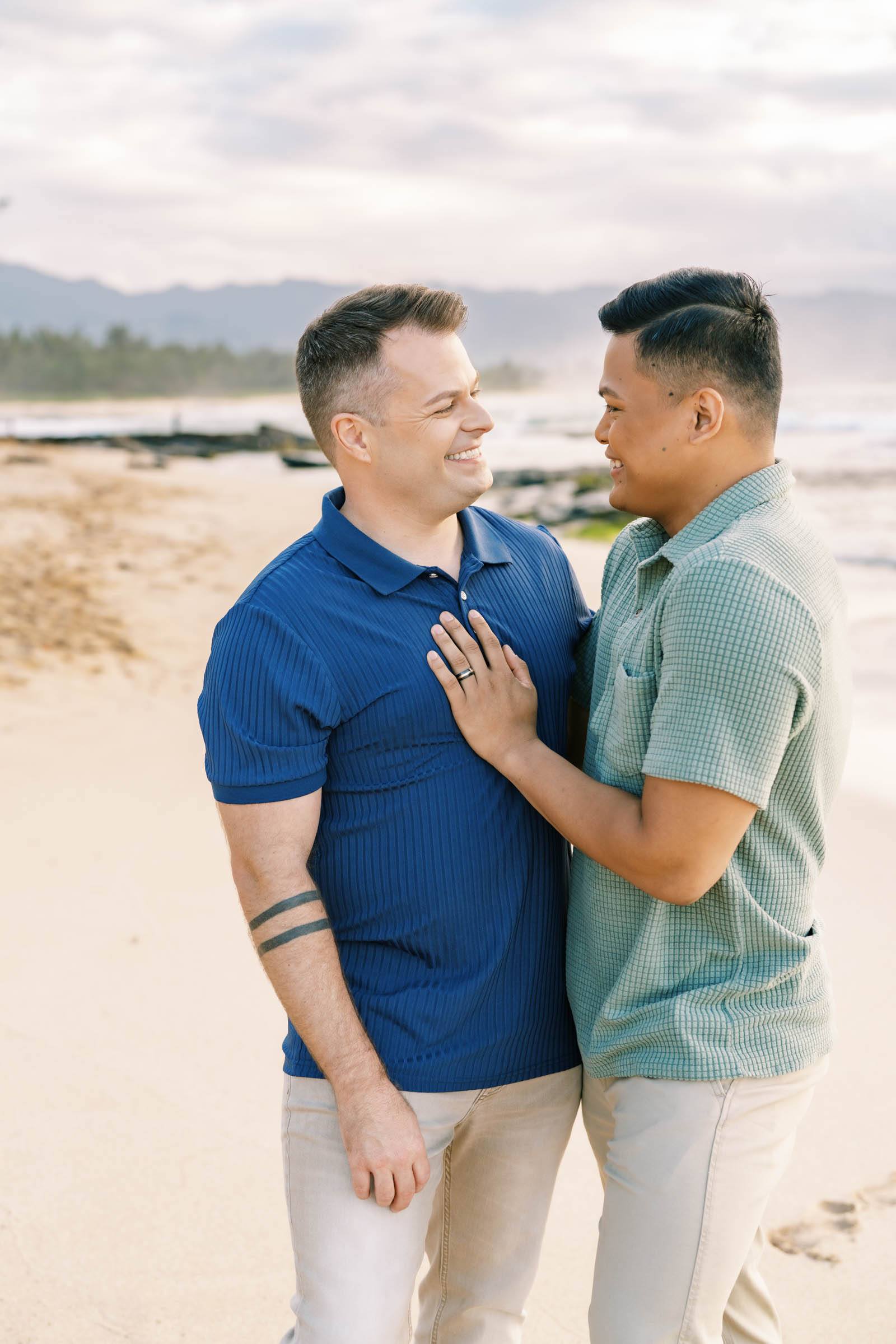 LGBTQ Gay Couple Hugging on the Haleiwa Beach