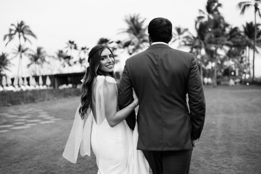 Black and White Image of newlyweds walking elopement on Oahu