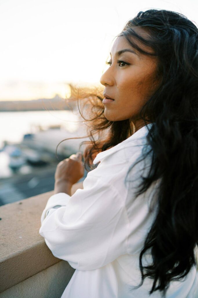 Woman on the rooftop looking away - Personal Branding Session for a Hawaii Actor