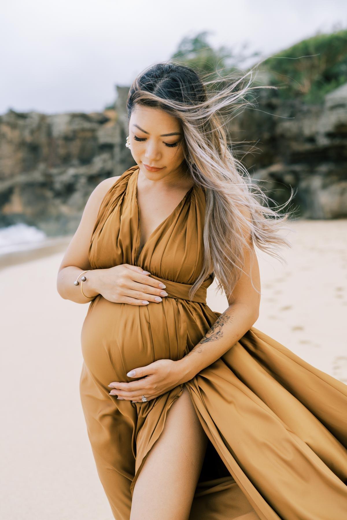 North Shore Maternity Photos of a woman in brown dress - Honolulu