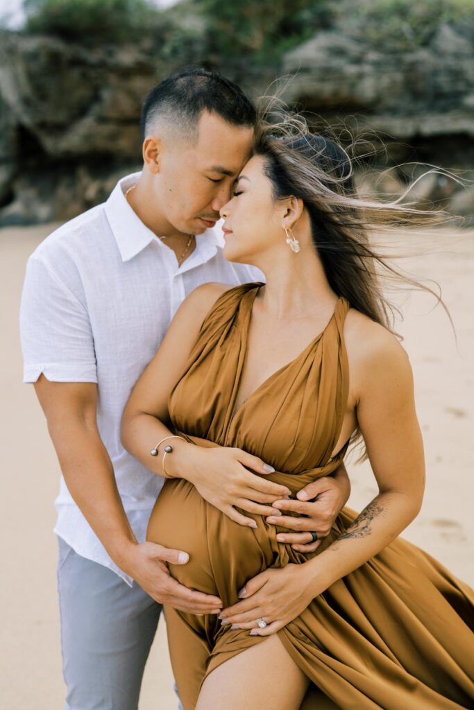 North Shore Maternity Photo of a couple holding the baby bump