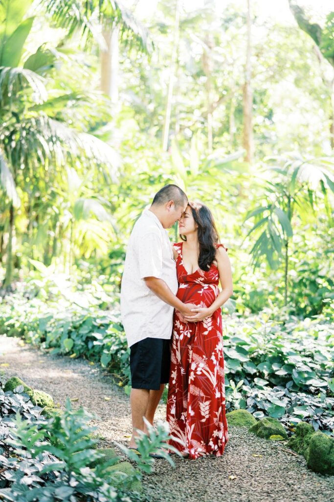 A couple on their Pregnancy Photo Session at Oahu Botanical Garden