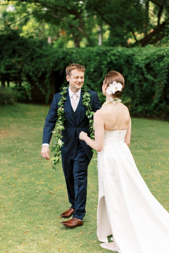 Newlyweds walking in the garden wedding on Kauai