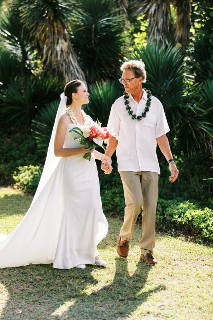 Bride walking with her father Wedding on Kauai 